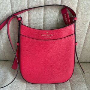 Women’s crossbody purse with adjustable strap.